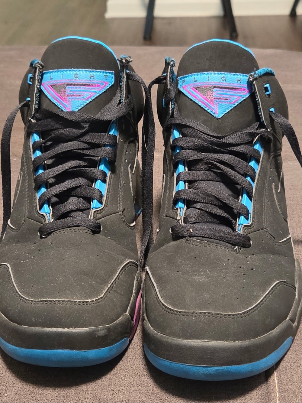 Nike Black Sneakers with Blue and Pink Accents